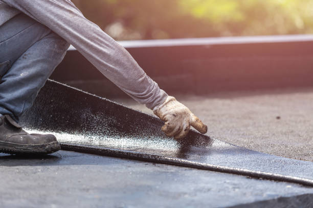 Professional Basement Waterproofing technician working in Columbiana, OH